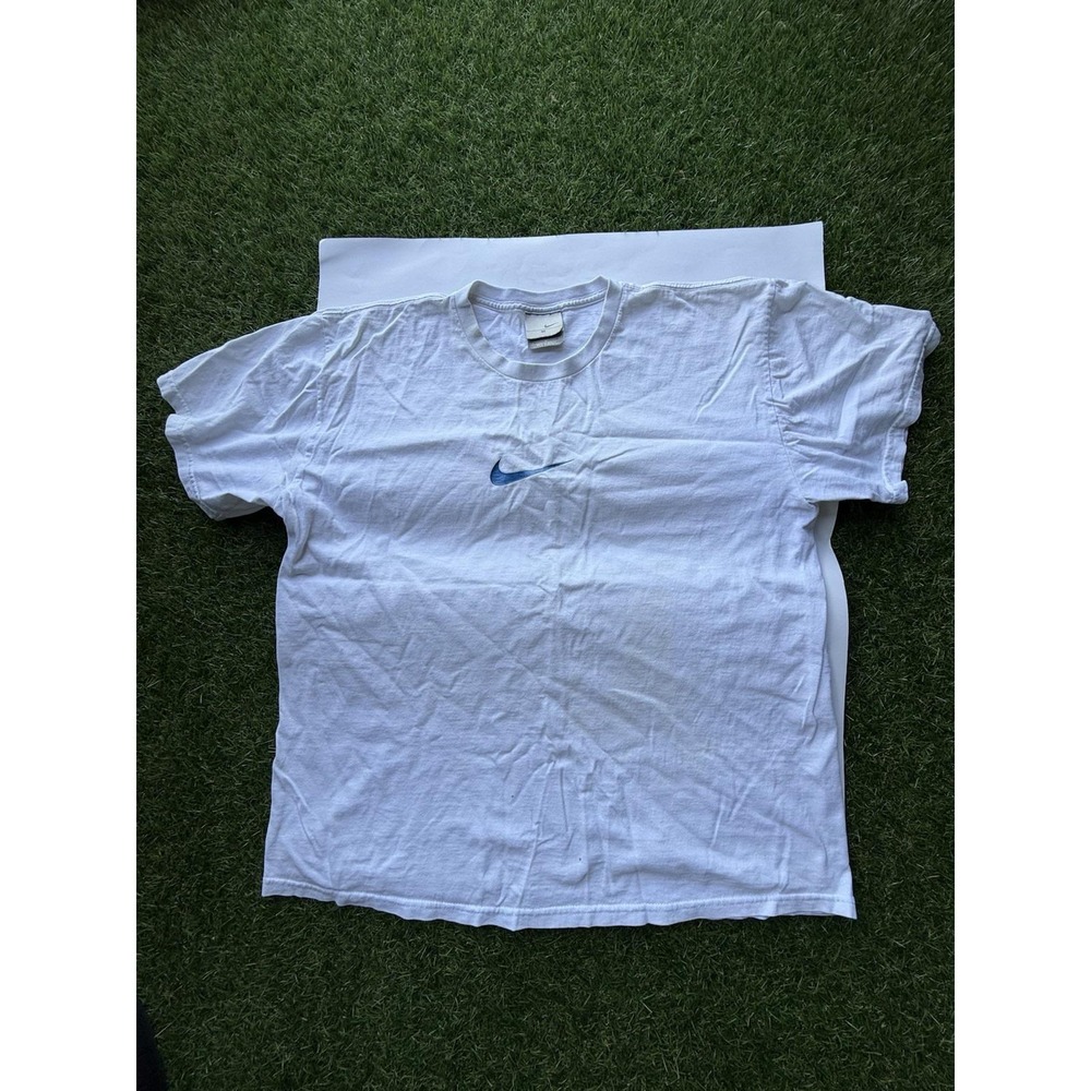 Vintage Nike with a blue Swoosh logo